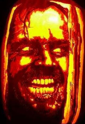 Here's Johnny scene from the movie the shining carved into halloween pumpkin.