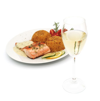 Salmon, couscous and strawberries on a plate with glass of white wine.